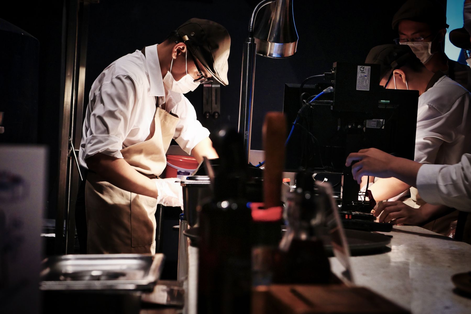 Professional chefs coordinating during restaurant service